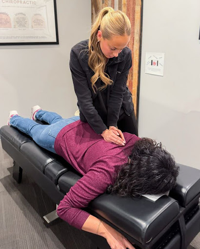 Active adult in their 30s receiving a chiropractic adjustment to support strength, balance, and prevent injury, showing why 30s need chiropractic care.